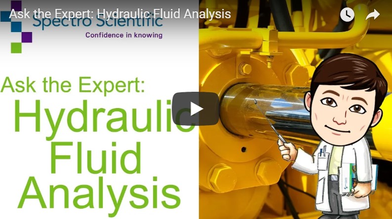 Scientist pointing to hydraulic system with link to 'Ask the Expert: Hydraulic Fluid Oil Analysis'